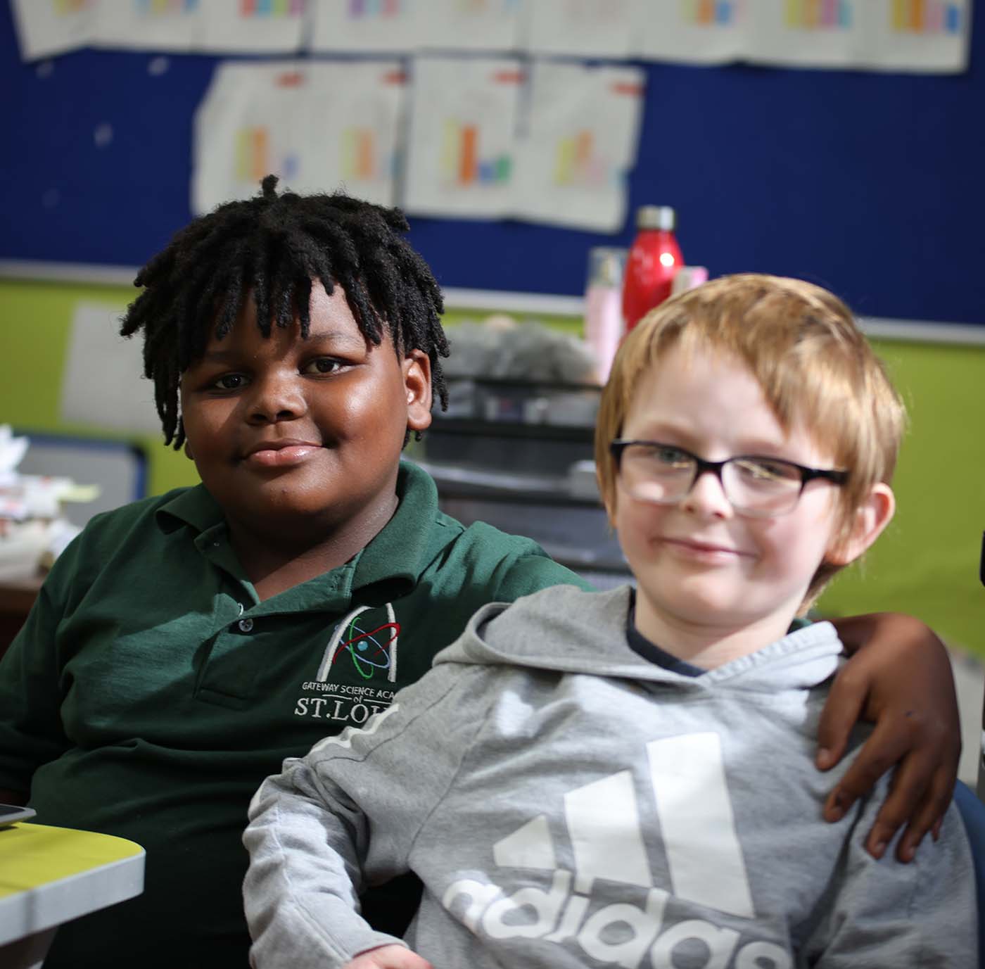 GSA St. Louis South student drawing at a desk in a classroom setting